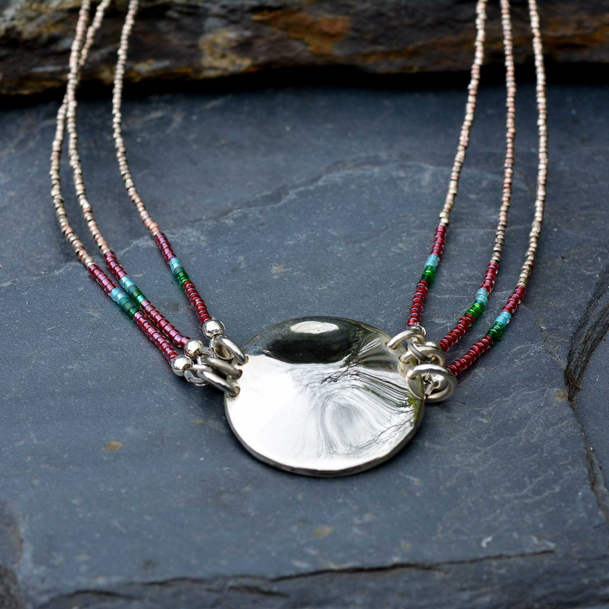 Three-Strand Tourmaline Necklace with Silver Medallion