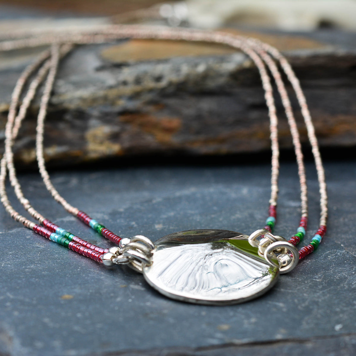 Three-Strand Tourmaline Necklace with Silver Medallion