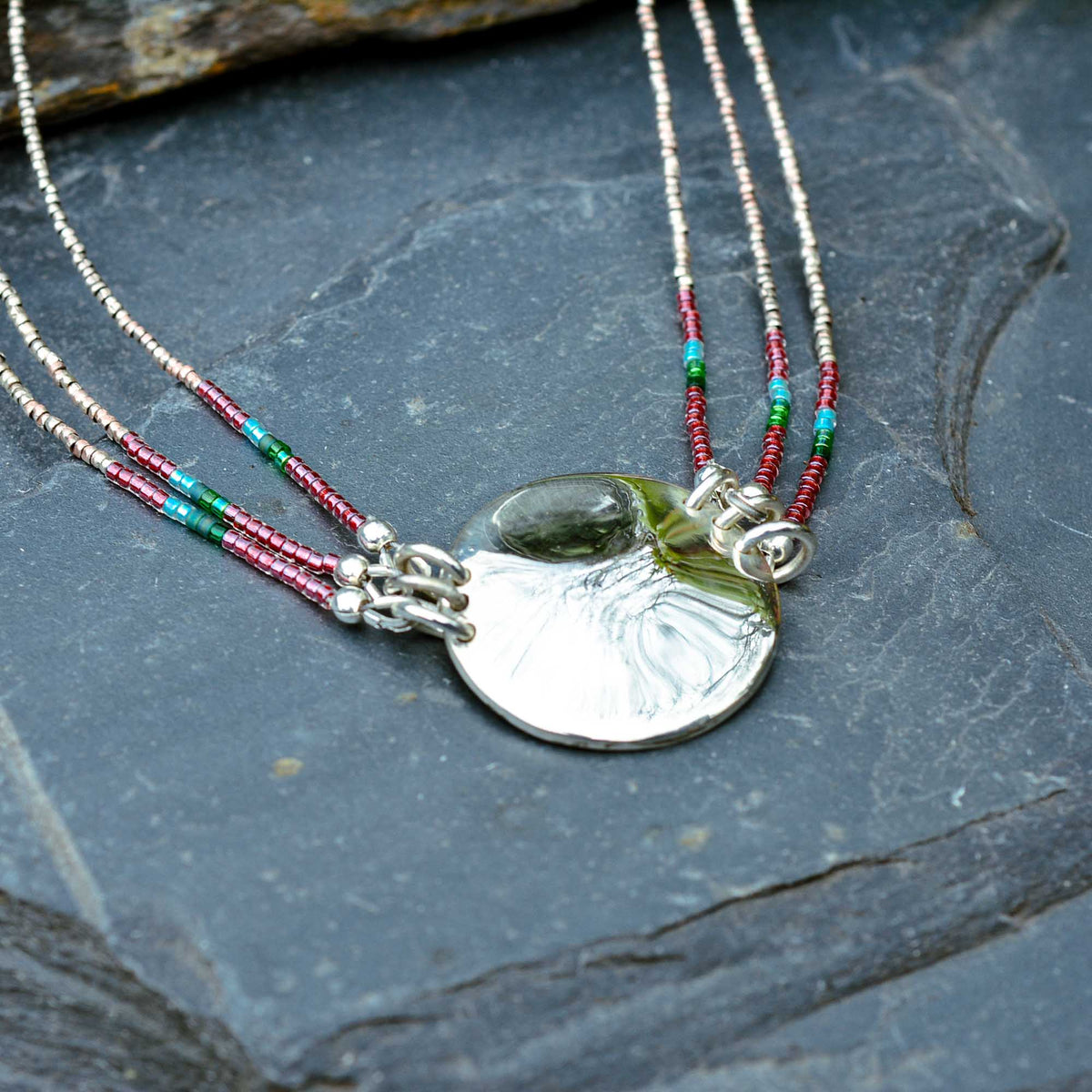 Three-Strand Tourmaline Necklace with Silver Medallion